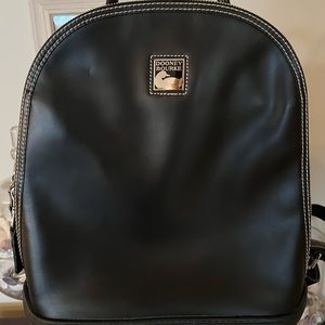 Authentic Dooney and Bourke leather backpack.